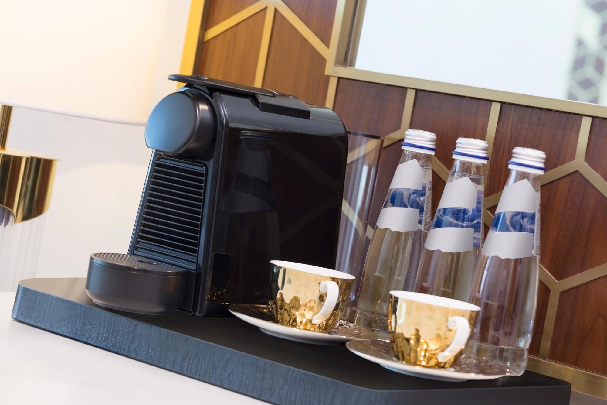 Velero Hotel Doha Lusail Экстерьер фото A Nespresso coffee machine